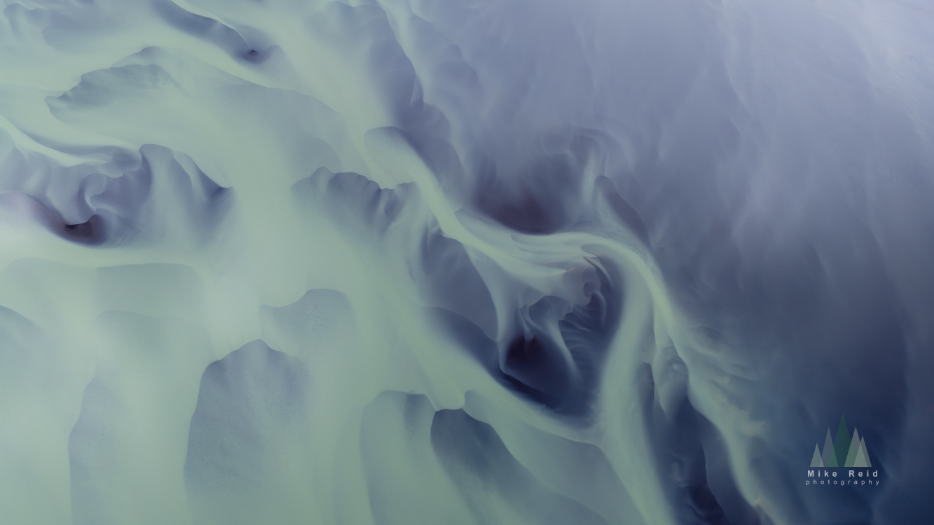 Iceland ice forms with subtle structure and cool blue-gray tones