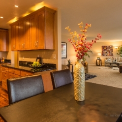 Queen Anne Condo Living Room and Kitchen  Single shot of the kitchen and living room with Sony a7r and Zeiss 18mm lens. To order a print please email me at  Mike Reid Photography : real estate photography, dining room, hdr, living room, seattle, aerial photography, beautiful, kitchen, bathroom