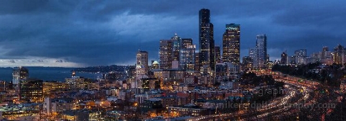 Twilight Cityscape of Seattle from Rizal Park As evening descends on Seattle, the city lights begin to glow beneath a dramatic twilight sky. Captured from Rizal Park, this timeless view highlights the heart...