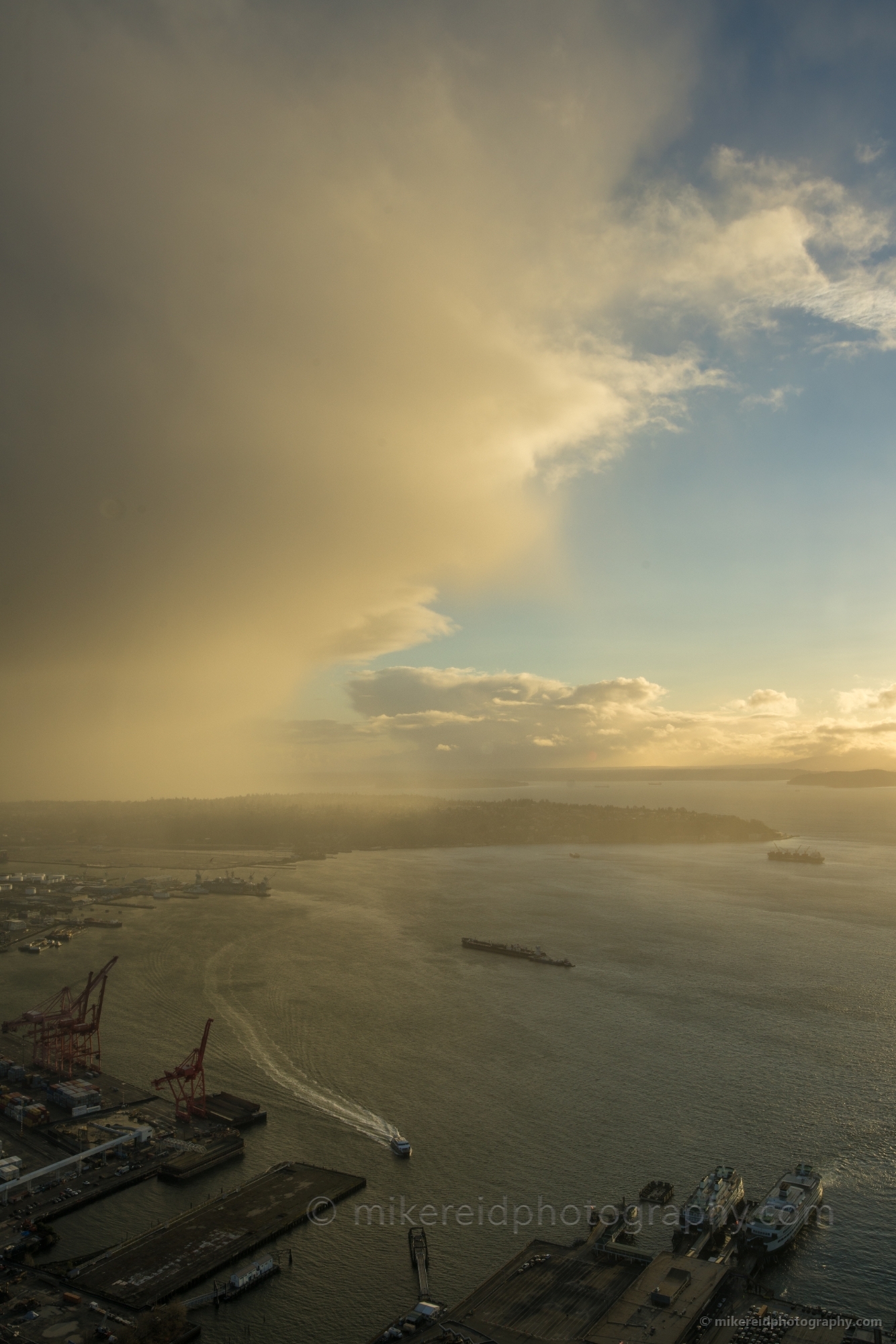 Rain Squall Over Alki and the Water Taxi Sky View Observatory Seattle