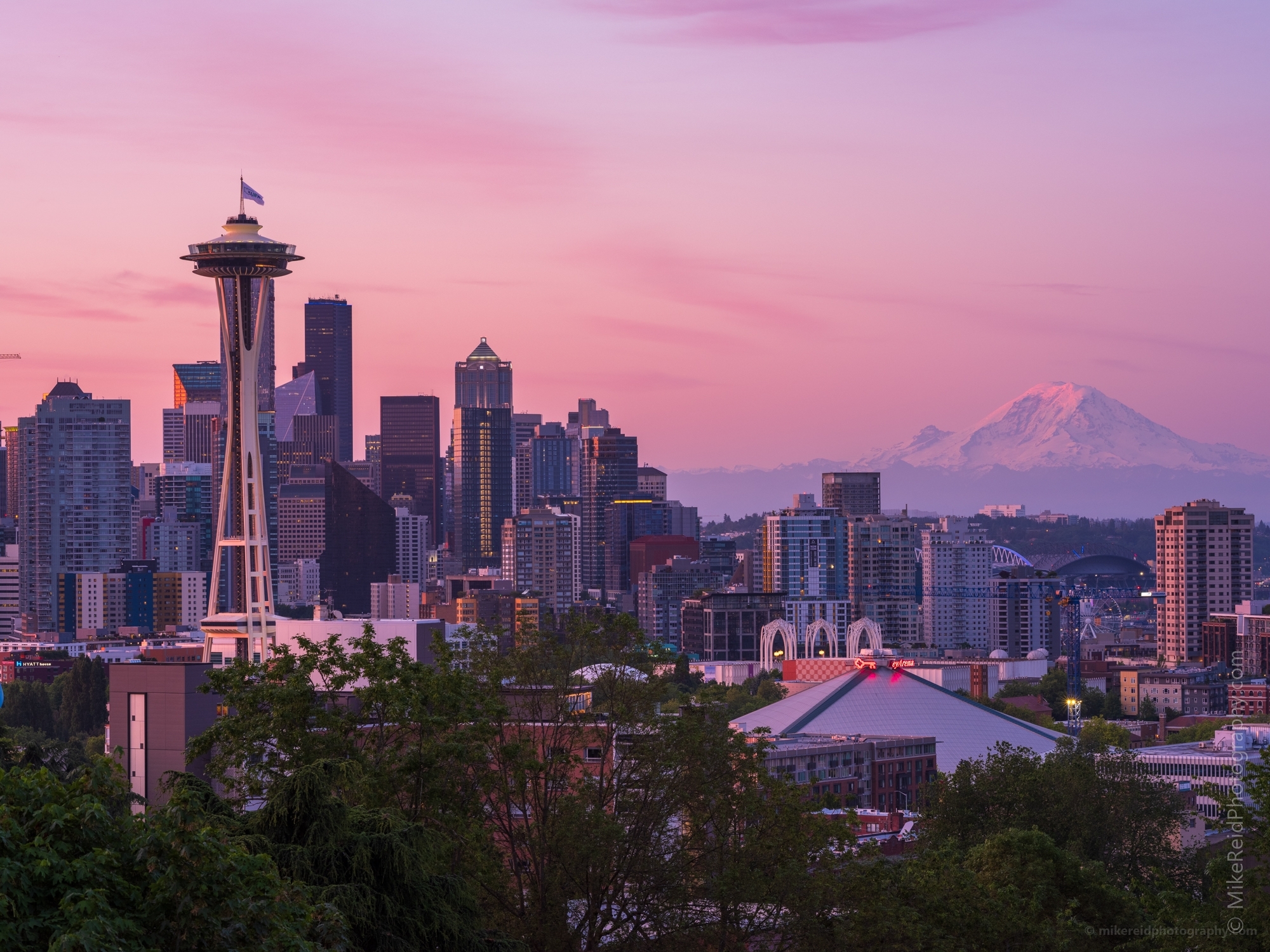 Seattle Kerry Park Dawn Pink.jpg Photography from Seattles Kerry Park is iconic. Everyone wants to go there when they visit to take That Shot. I love being there at sunrise or sunset to see how the light is highlighting the city and Mount Rainier. Contact me for custom Seattle photography tours.