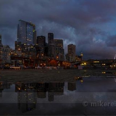 Dramatic Seattle Pier Pool Reflection Sunset To order a print please email me at  Mike Reid Photography : sunset, sunrise, seattle, northwest photography, dramatic, beautiful, washington, washington state photography, northwest images, seattle skyline, city of seattle, puget sound, aerial san juan islands