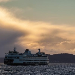 Seattle Storm Ferry  Classic shot of a ferry returning from Bainbridge Island across Elliott Bay To order a print please email me at  Mike Reid Photography : sunset, sunrise, seattle, northwest photography, dramatic, beautiful, washington, washington state photography, northwest images, seattle skyline, city of seattle, puget sound, aerial san juan islands, reid, mike reid photography