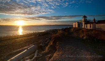 Discovery Park Lighthouse Sunset Evening Seattles Discovery Park began as an Army base in the earlier part of the century. Its now an immense park, with many trails and photo opportunities. Some of my...