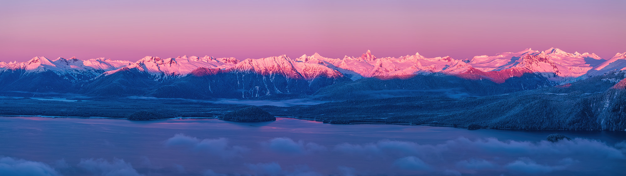 Production proof of a four-panel Coast Range Alpenglow photographic installation for Petersburg Medical Center
