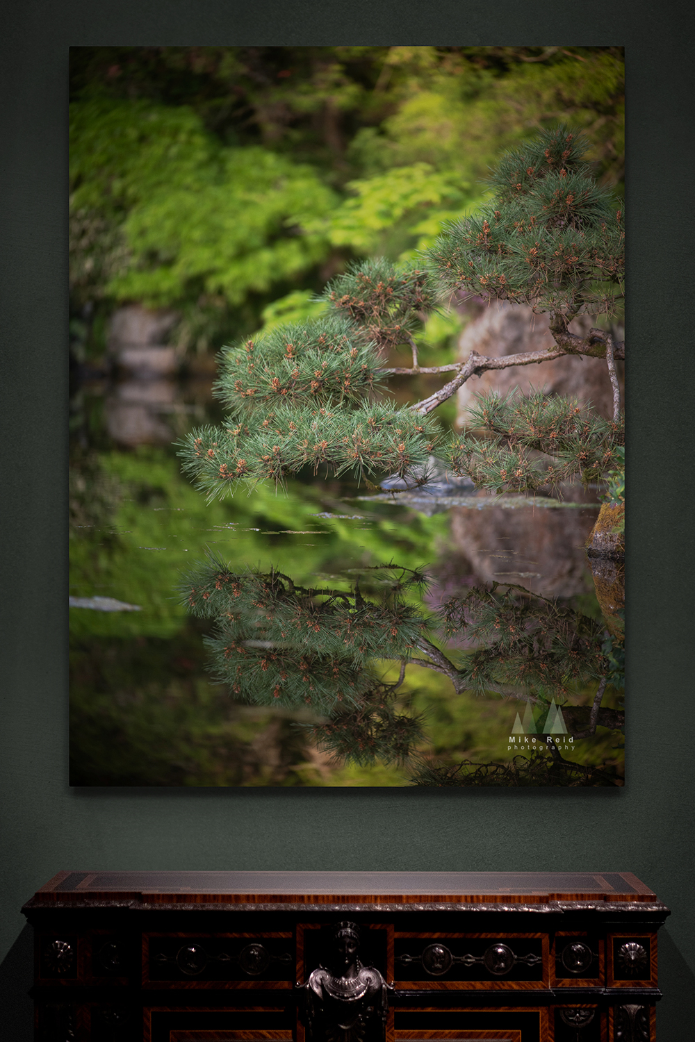 Conceptual home interior featuring a quiet pine reflection photograph