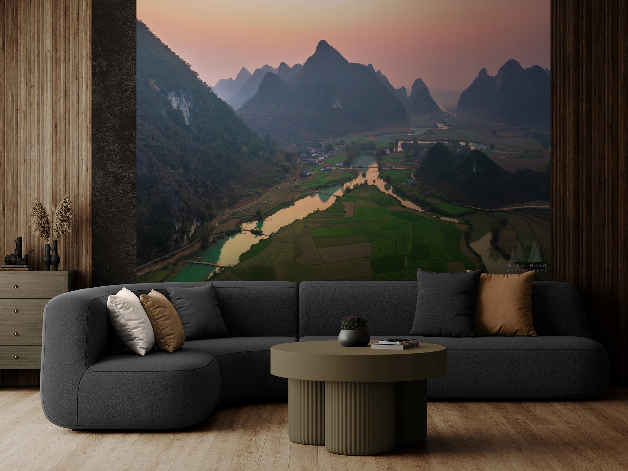 Large photographic artwork of northern Vietnam karst landscape in a modern living room