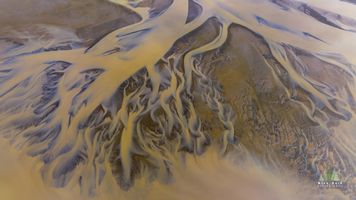 Braided River Delta, Iceland – Aerial Abstract of Glacial Flow This breathtaking aerial photograph captures the mesmerizing patterns of Iceland’s braided river deltas, where glacial meltwater winds its way across volcanic...