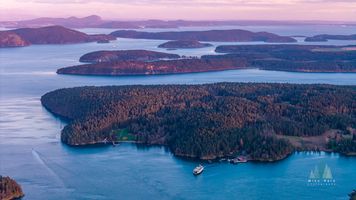 San Juan Islands Aerial Ferry Leaving Lopez Puget Sound Washington default