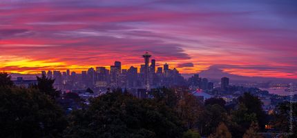 Seattle Kerry Park Burning Sunrise Panorama GFX50s A gorgeous fiery sunrise over Seattle captured from Kerry Park, where vivid shades of crimson, magenta, and gold ignite the morning sky. Lenticular clouds swirl...