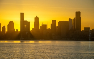 Seattle Sunrise Sunrays Skyline Seattle's waterfront presents numerous photo opportunities. Views of the Olympic Mountains, Elliott Bay, Puget Sound, Alki Point and back at the Seattle skyline...