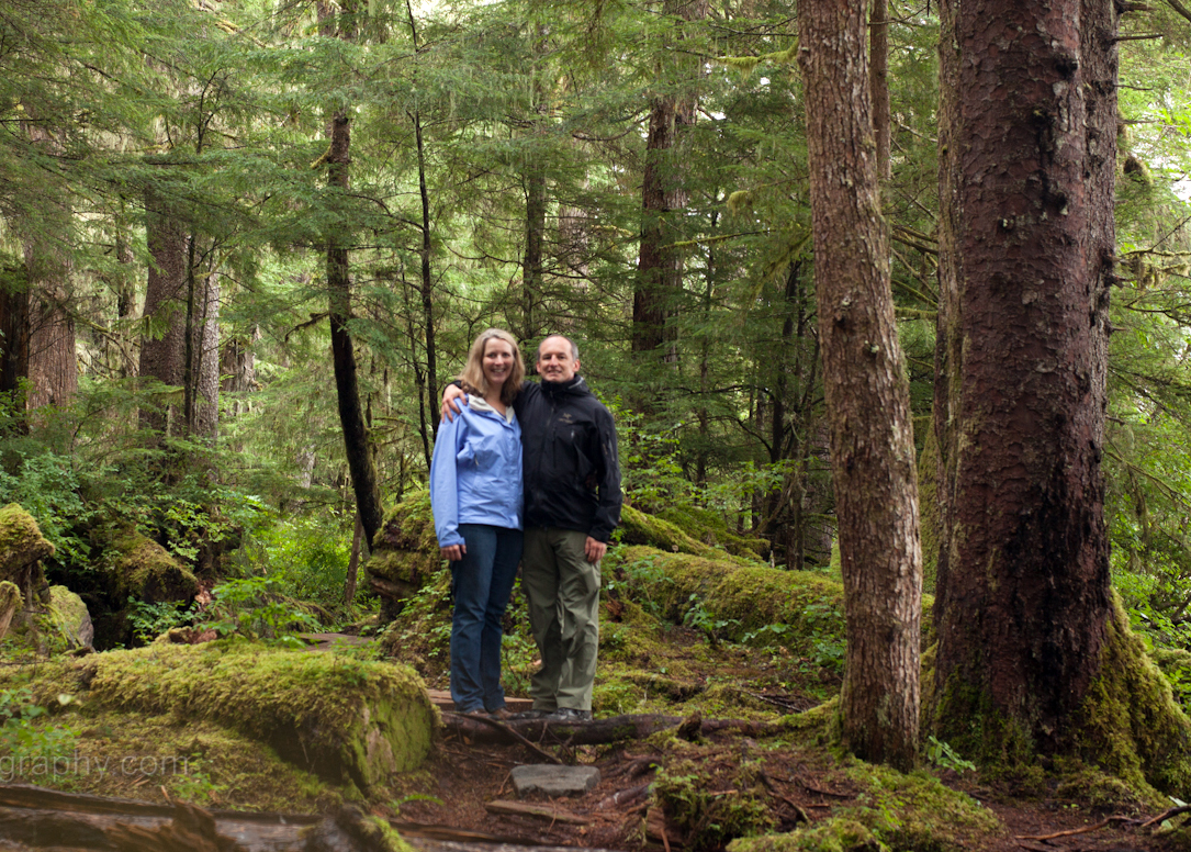 Mike and Natalie standing in a mossy Southeast Alaska forest