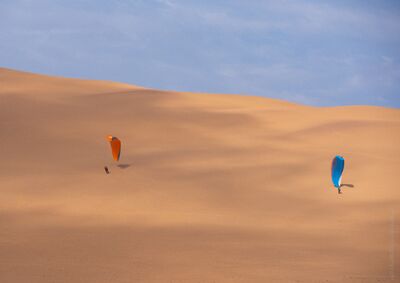 Namibia Photography Parasailers Above the Dunes