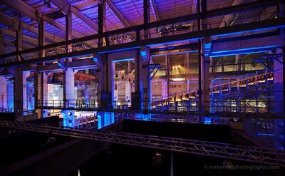 Tresor Berlin Industrial Event Interior A wide interior view inside Tresor in Berlin, Germany, showing the raw industrial structure of the former power station transformed with dramatic blue and...