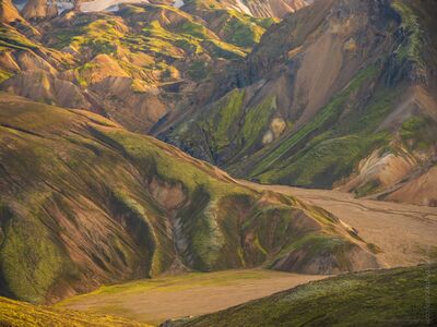 Iceland Ridge Landmannalaugar Highlands Zeiss 100-300mm GFX50s Details.jpg Golden light sweeps across the ridges of Iceland’s Landmannalaugar Highlands, illuminating layers of volcanic earth and moss-covered slopes. Captured with the...