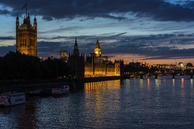 Big Ben and the Houses of Parliament at Blue Hour A blue-hour view across the River Thames toward Big Ben and the Houses of Parliament in Westminster, London. The Palace of Westminster glows warmly against the...