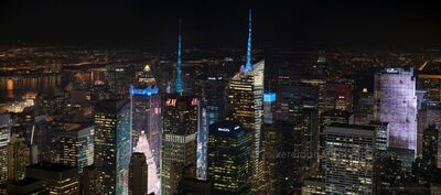 Times Square and Midtown Manhattan Skyline at Night Panorama A sweeping nighttime panorama of Midtown Manhattan, New York City, looking north toward the illuminated skyscrapers of Times Square from the Empire State...