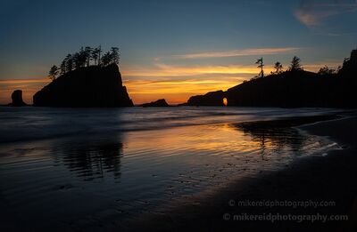 Second Beach Evening Glow Through the Hole in the Wall The last light of evening glows through the Hole in the Wall at Second Beach on Washington’s Olympic Coast. Dark sea stacks and coastal cliffs fall into...