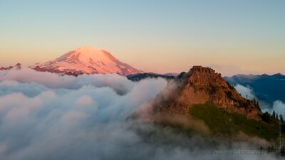 Mount Rainier and Yakima Peak Above the Fog at Sunrise — Northwest Aerial Photography A breathtaking Pacific Northwest aerial capturing Mount Rainier and Yakima Peak rising above a sea of morning fog at sunrise. The first light paints Rainier’s...