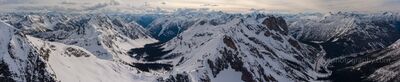 Over the North Cascades — Silver Star, Kangaroo Peak, and Liberty Bell Panorama Aerial Photography A sweeping aerial panorama over the North Cascades featuring Silver Star Mountain, Kangaroo Peak, and Liberty Bell framed in snow-covered grandeur. The rugged...