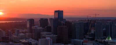 Aerial Bellevue Sunset Skyline.jpg Aerial sunset view of downtown Bellevue, Washington, as warm red and orange light settles behind the city skyline. The setting sun glows along the western...
