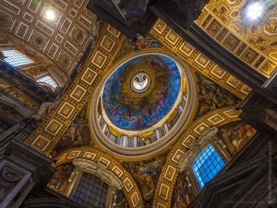 Painted Dome Inside St. Peter's Basilica A richly decorated dome inside St. Peter's Basilica in Vatican City, surrounded by gilded coffers, painted figures, massive arches, and deep-set windows. The...
