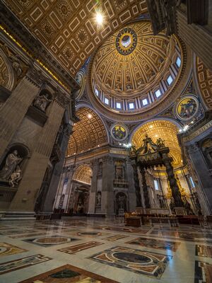 St. Peter's Basilica Interior and Dome A sweeping interior view of St. Peter's Basilica in Vatican City, looking toward Michelangelo’s great dome and Bernini’s monumental bronze baldachin. Marble...