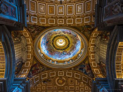 Painted Dome Inside St. Peter's Basilica A dramatic upward view inside St. Peter's Basilica in Vatican City, centered on one of the richly painted domes and surrounded by gilded coffers, monumental...
