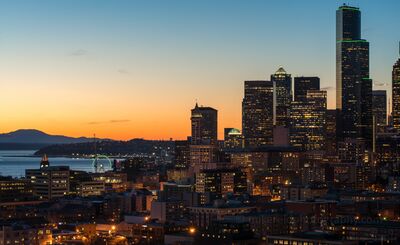 Downtown Seattle Golden Dusk from Rizal Park Warm golden dusk settles over downtown Seattle, photographed from Dr. Jose Rizal Park on Beacon Hill. Columbia Center dominates the skyline while Smith Tower,...